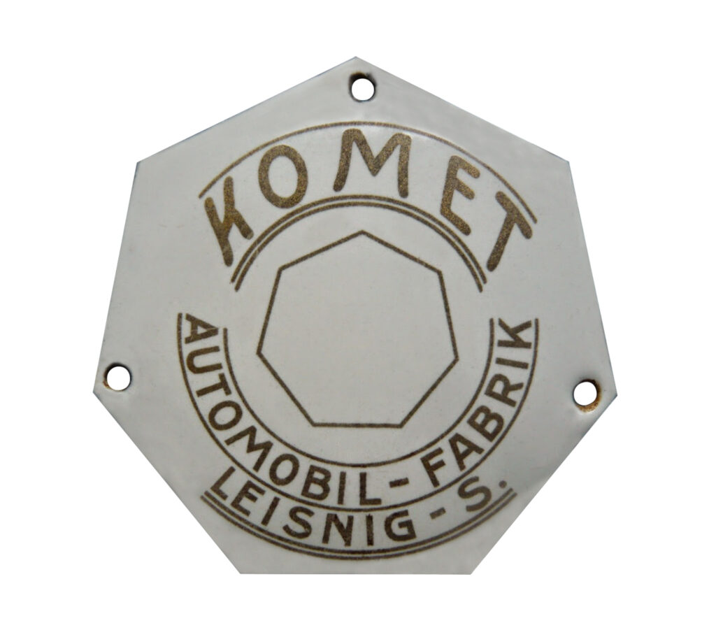 Komet Automobil-Fabrik emblem. (source: Radiator Emblem Collection)