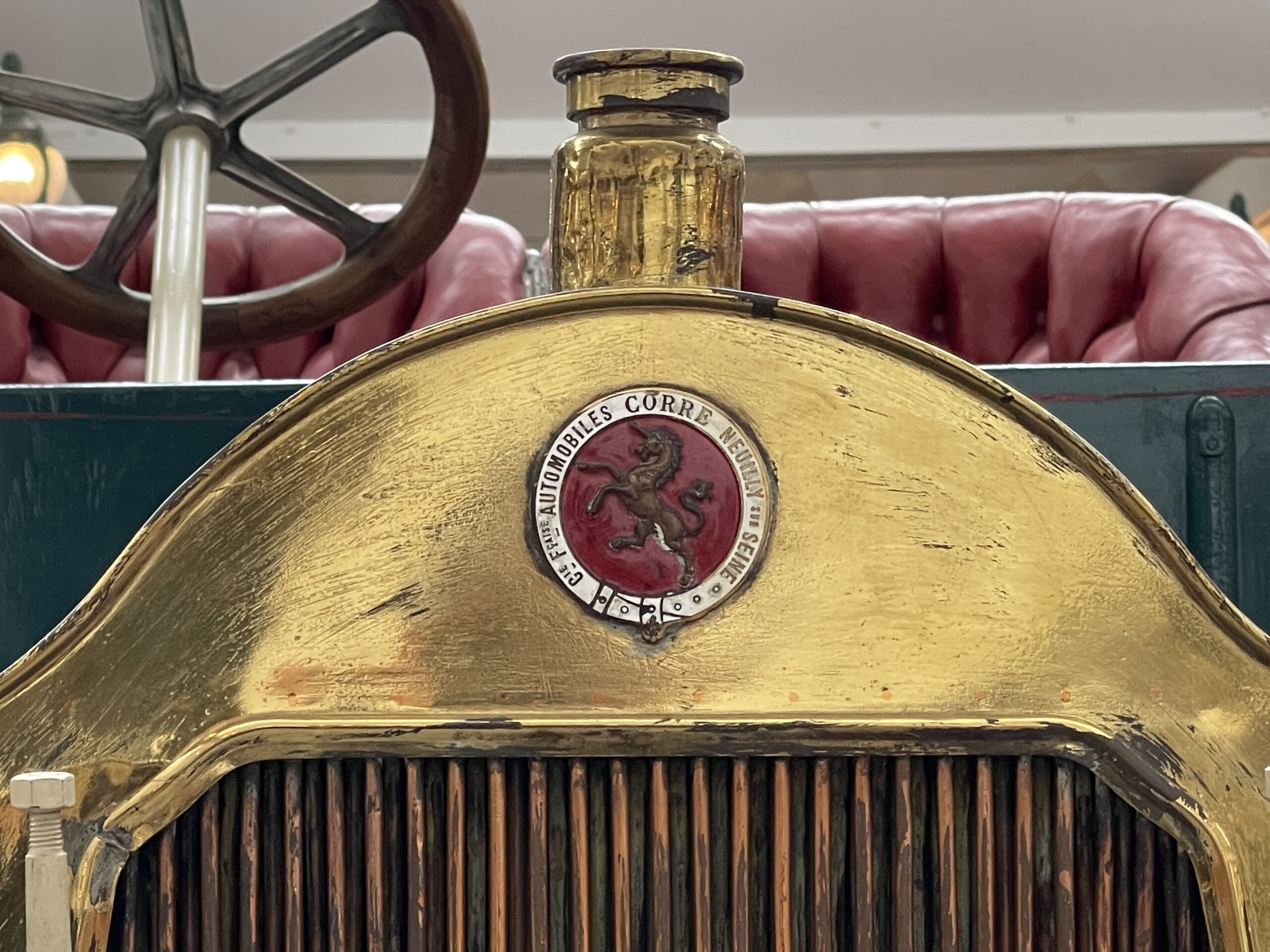 1906 Corre-La Licorne Biplace Sport Type J radiator emblem. (©Photo by Segura)