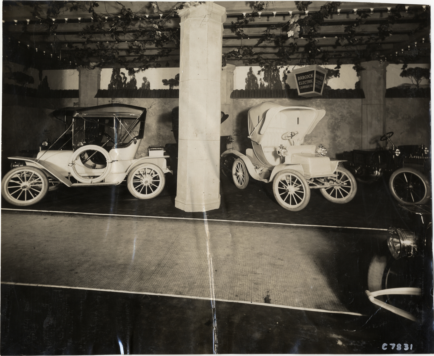 Two Babcock Electric cars on exhibit in 1909. (source: National Automotive History Collection, Detroit Public Library)