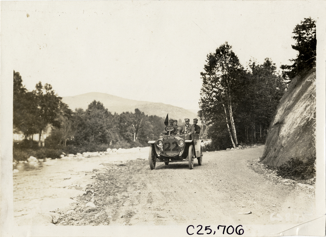 Motorists in Cino car no. 22 traveling on rural dirt road during the 1910 Munsey Historic Tour. (source: National Automotive History Collection, Detroit Public Library)