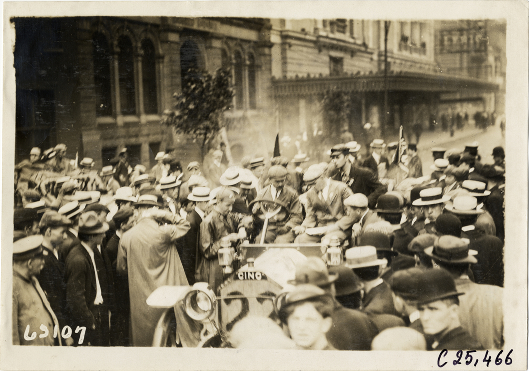 Crowd of spectators surrounding motorists in Cino car no. 22 during the 1910 Munsey Historic Tour. Organized by the Munsey newspapers, the endurance contest covered a route through ten states. (source: National Automotive History Collection, Detroit Public Library)