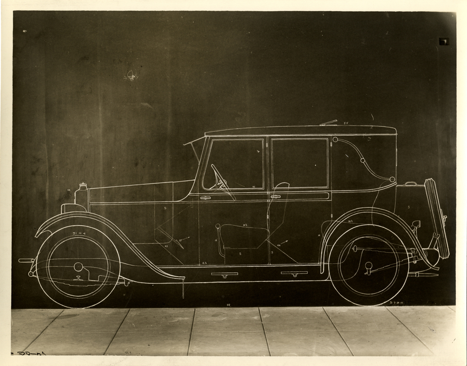 Full-size mechanical drawing on garage wall of a Da Vinci automobile in 1922, designed by James Scripps Booth. (source: National Automotive History Collection, Detroit Public Library.)