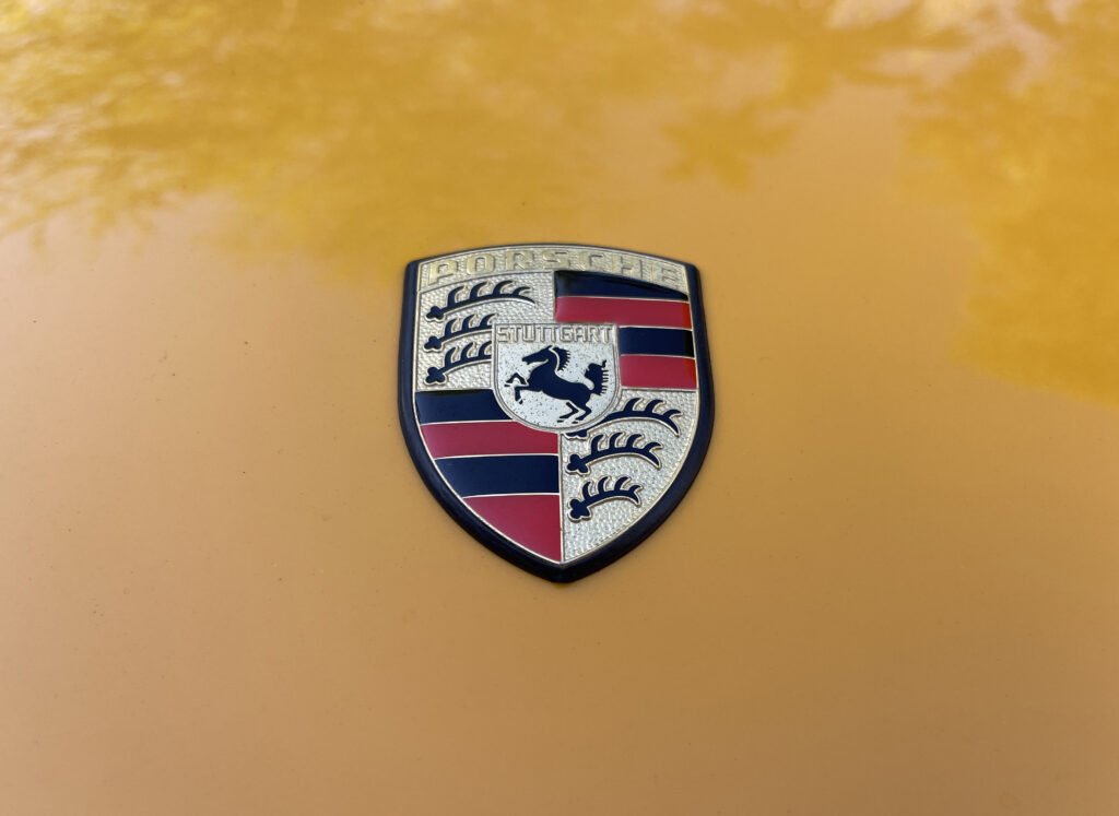 Porsche Crest emblem. (©Photo by Segura)