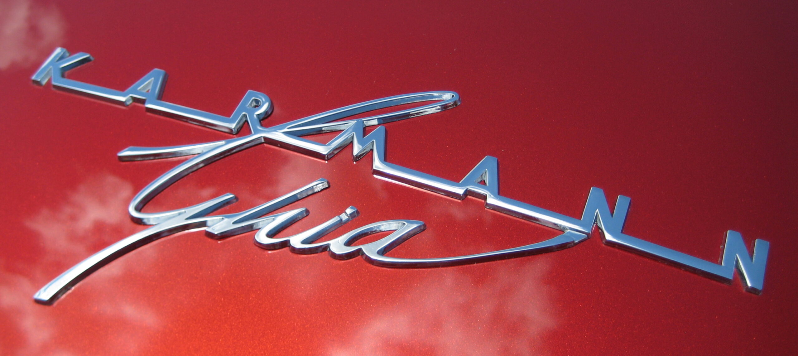 Volkswagen Karmann Ghia emblem. (©Photo by Segura)